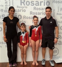 Mainardi y Cappocci con sus entrenadores.